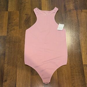 Free People Intimately Soft Pink Bodysuit (size M/L)